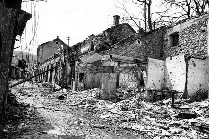 Break-up of Yugoslavia & The War in Mostar: Life Under Siege - Stop 1: The abandoned aircraft hangar and Tito’s hidden military logic