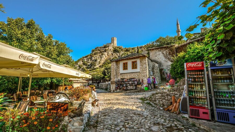 From Split and Trogir: Mostar Tour with Kravica Waterfalls - Mostar walking tour: Stari Most, Ottoman streets, and real local perspective