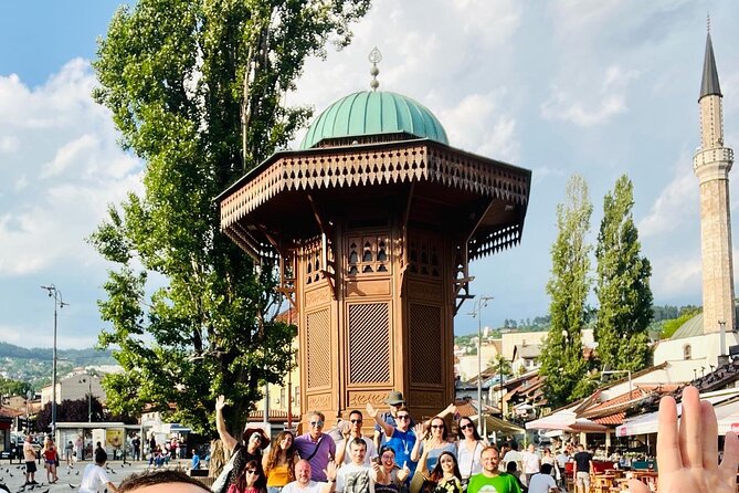 PROFESSIONAL SARAJEVO WALKING TOUR - With guide who guided STING! - Stop 3: Ferhadija Pedestrian Street, Tito Street, and the Eternal Flame