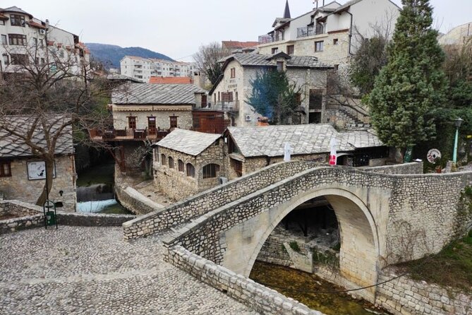 Walking Tour in Old Town Mostar - Crossing the Old Bridge and stepping into Kujundžiluk